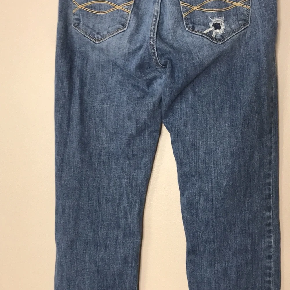 Abercrombie and Fitch medium wash boot cut‎ denim jeans size 6 distressed
